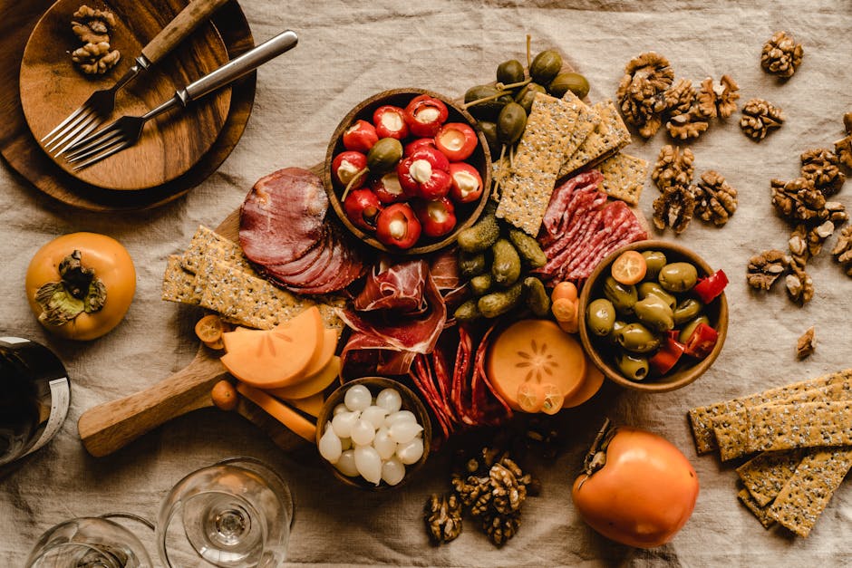Beautiful charcuterie board with meats, cheeses, and accompaniments.
